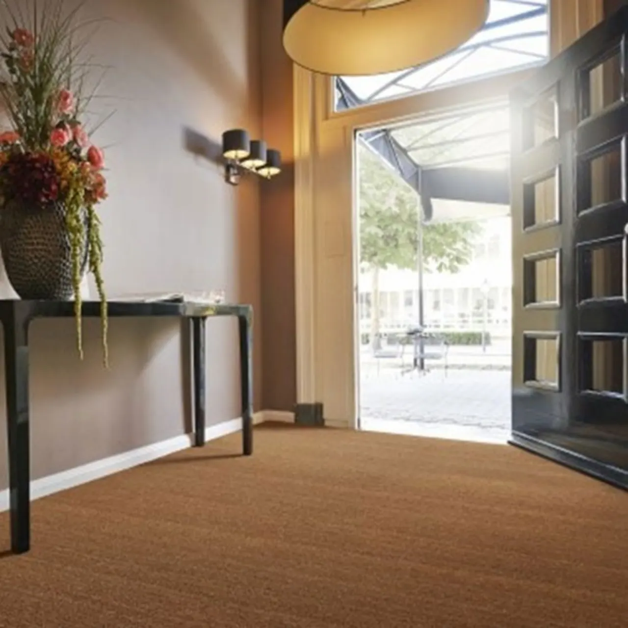 Poona Natural installed wall-to-wall in entry way