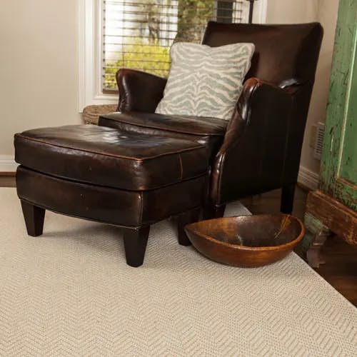 Newport Wheat polypropylene-wool rug in rustic sitting room