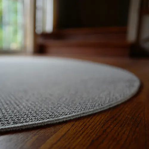 SynSisal®'s Langley as a custom circular rug with a serged edge
