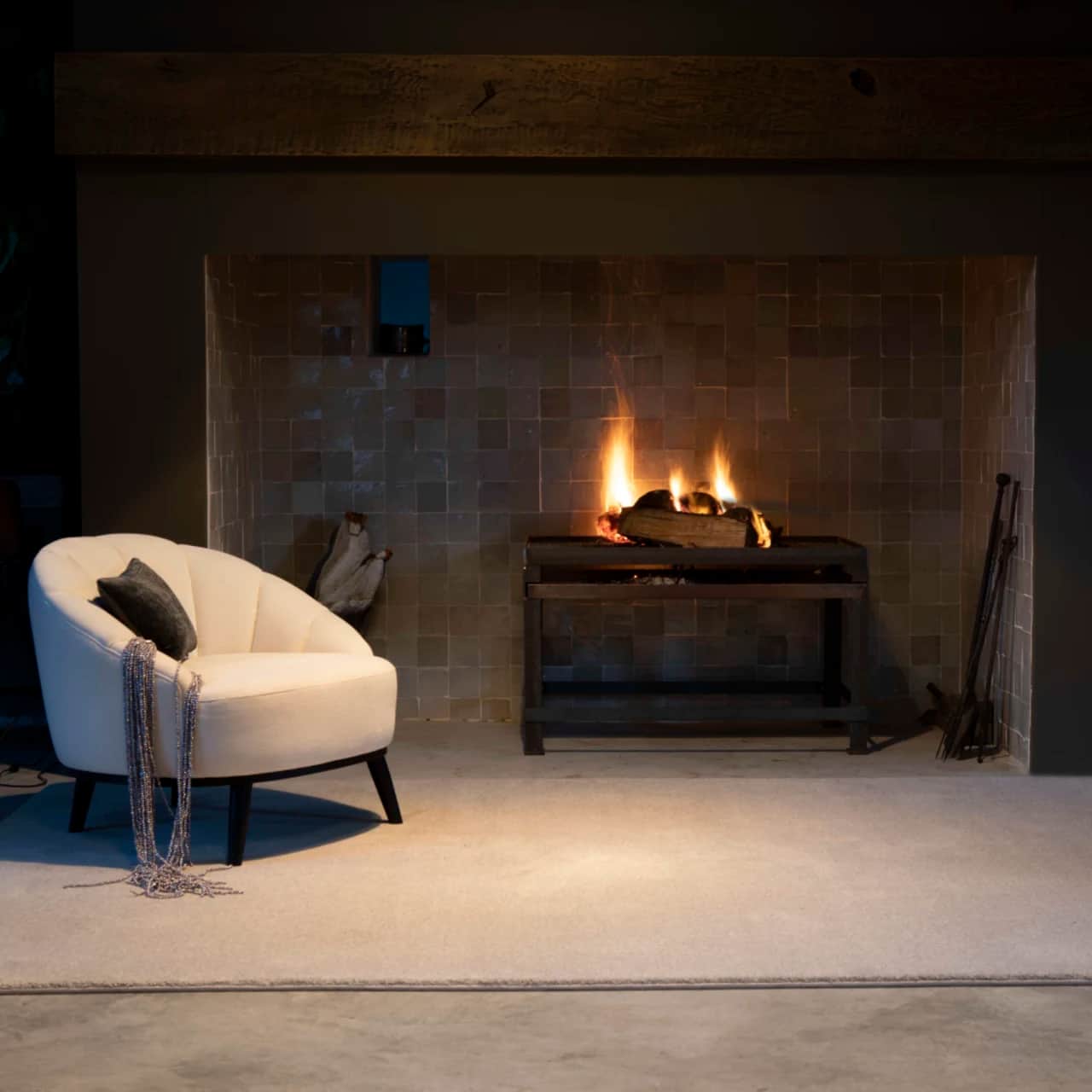 Fat Cat Silver wool rug by fireplace in sitting room