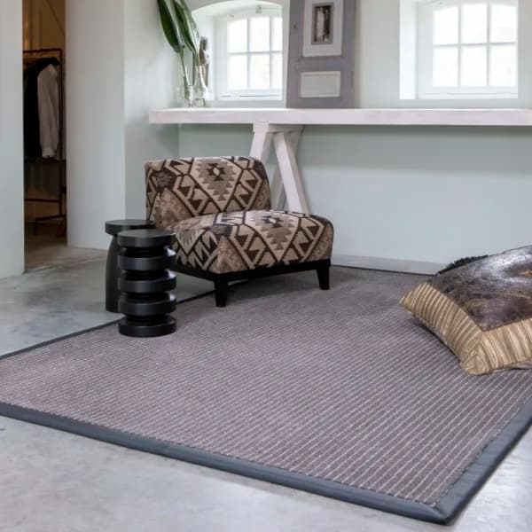 Chalk Route wool rug with leather border in sitting room